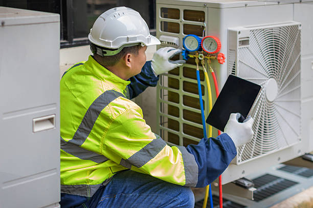 Professional Heat Pump Repair technician working in Greenfield, IA